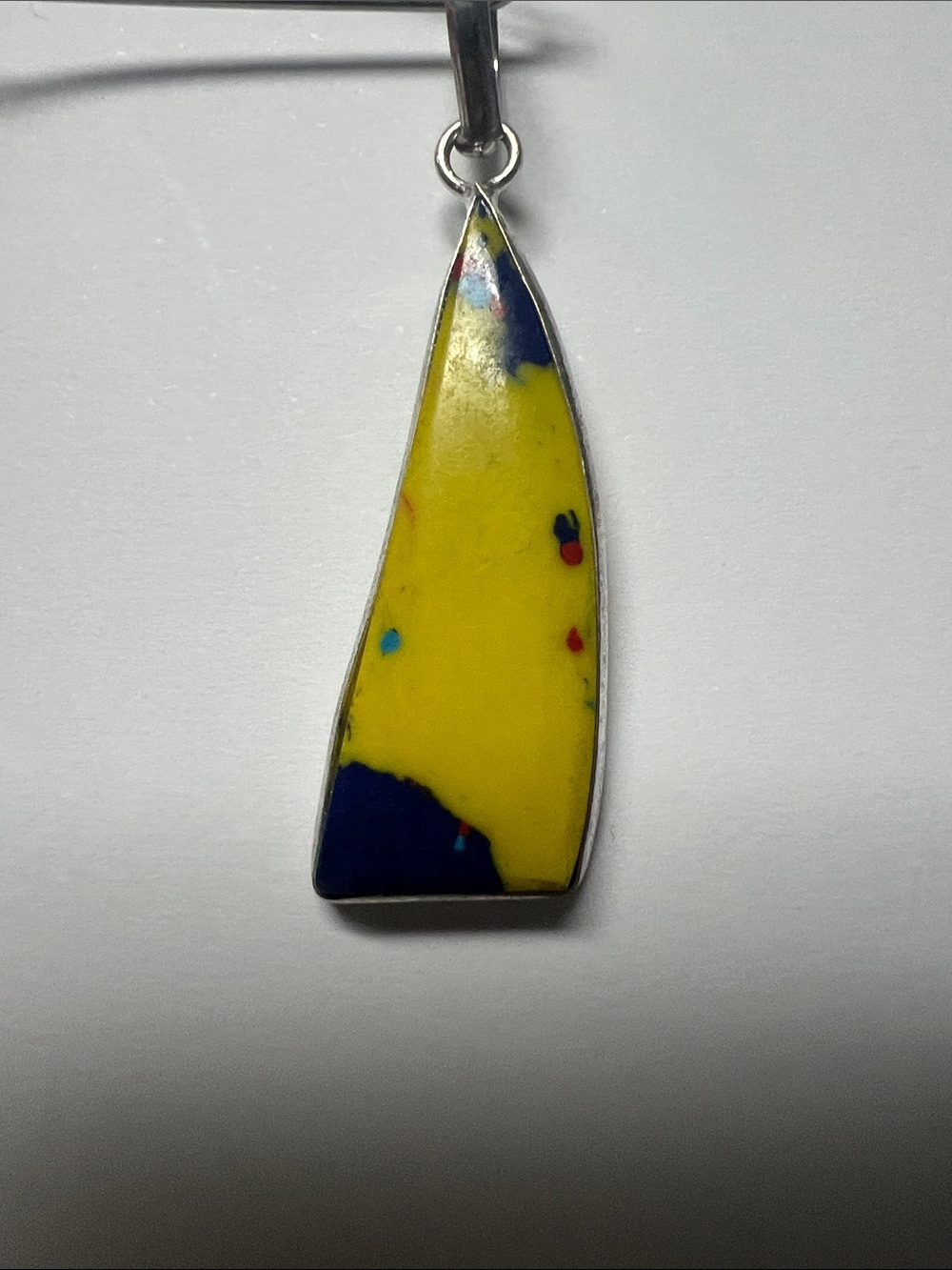 Yellow Mosaic Jasper pendant with silver tone frame